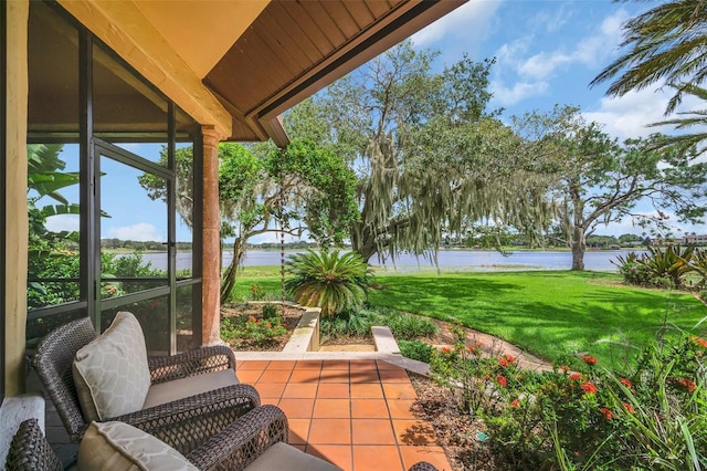 view of patio / terrace with a water view