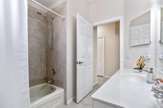 bathroom featuring vanity, tile patterned flooring, and shower / tub combo