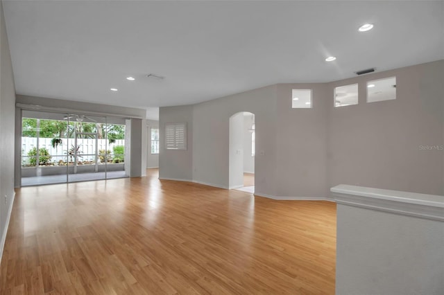 spare room with light wood-type flooring