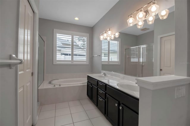 bathroom with plus walk in shower, tile patterned flooring, vanity, and a chandelier