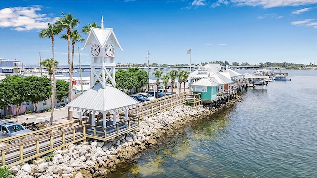 dock area with a gazebo and a water view