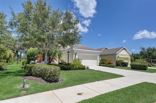 ranch-style house with a garage and a front yard