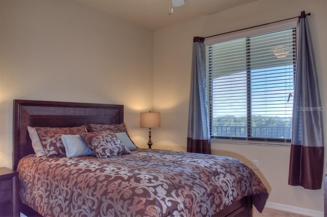 bedroom with carpet floors and ceiling fan