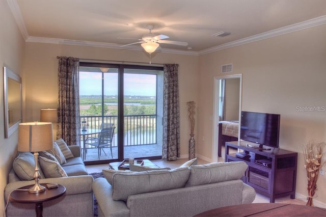 living room featuring ceiling fan and ornamental molding