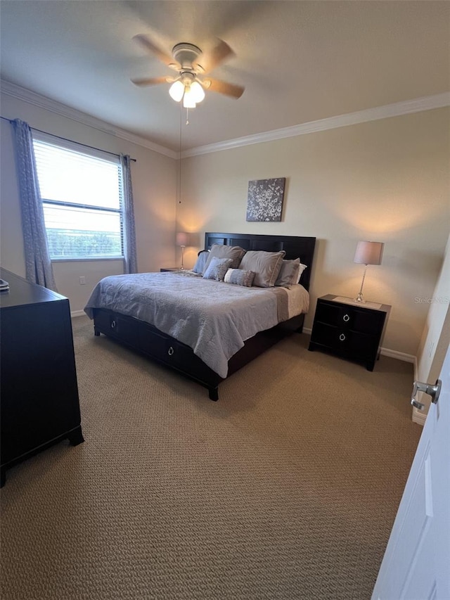 bedroom featuring ceiling fan, carpet floors, and crown molding