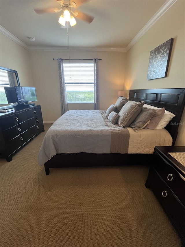 carpeted bedroom featuring ornamental molding, multiple windows, and ceiling fan