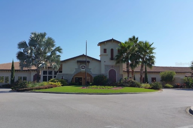 7005 River Hammock Dr Unit 404, Bradenton, FL 34212 - view of front of house with stone siding and stucco siding