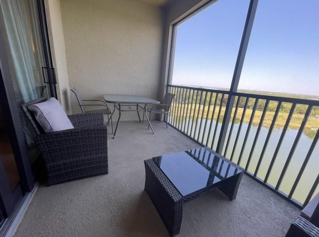 7005 River Hammock Dr Unit 404, Bradenton, FL 34212 - balcony featuring a water view
