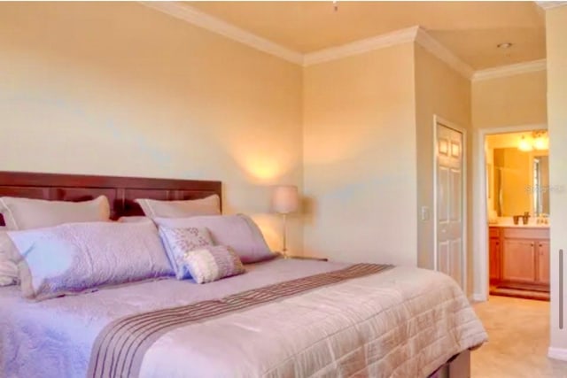 7005 River Hammock Dr Unit 404, Bradenton, FL 34212 - bedroom with crown molding, light colored carpet, and ensuite bath