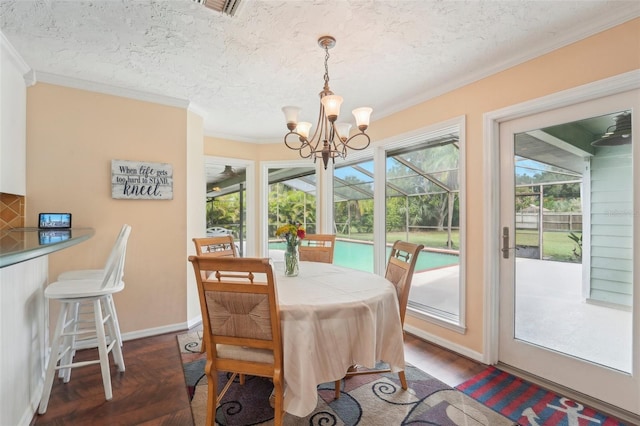 dining space with a textured ceiling, a healthy amount of sunlight, ornamental molding, and dark hardwood / wood-style floors