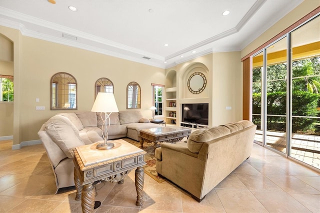 living room featuring ornamental molding, light tile patterned floors, a fireplace, and built in shelves