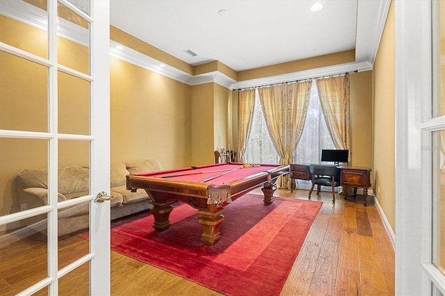 rec room featuring hardwood / wood-style flooring, pool table, and french doors