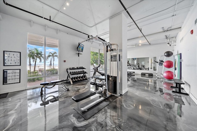 workout area with concrete floors