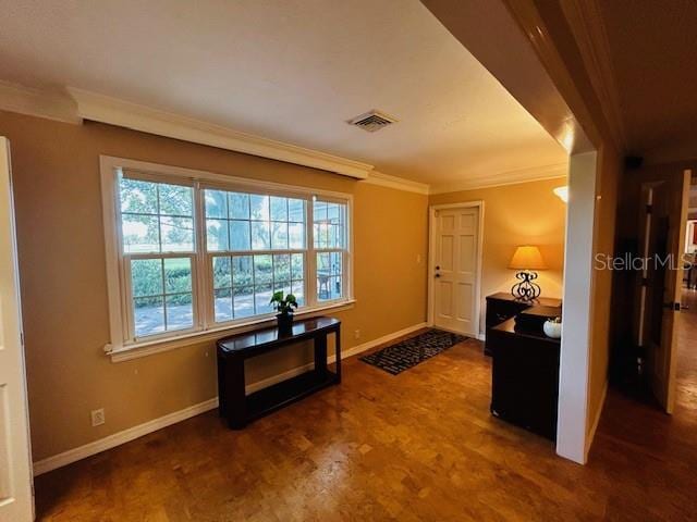 entrance foyer with ornamental molding