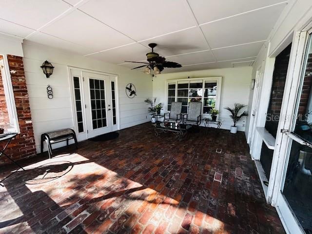 view of patio with ceiling fan and french doors