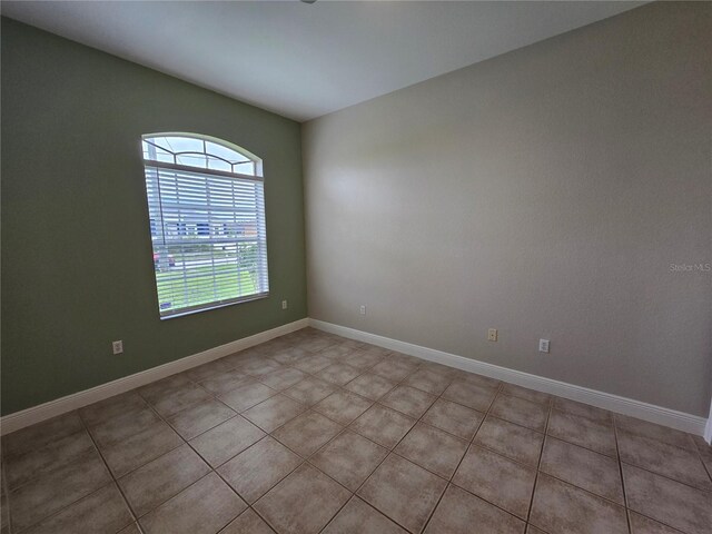 view of tiled empty room