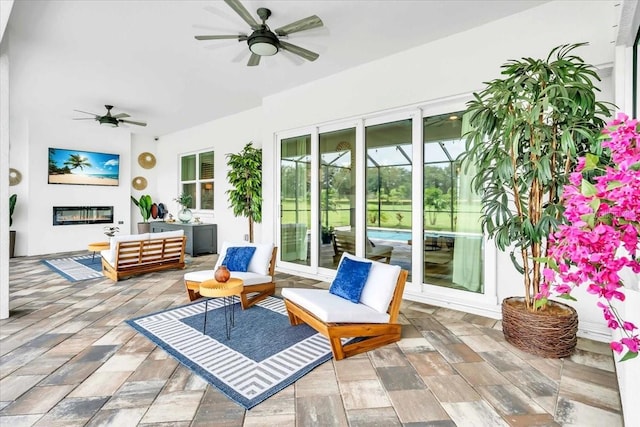 interior space featuring ceiling fan