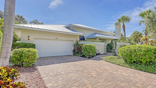 ranch-style home with a garage