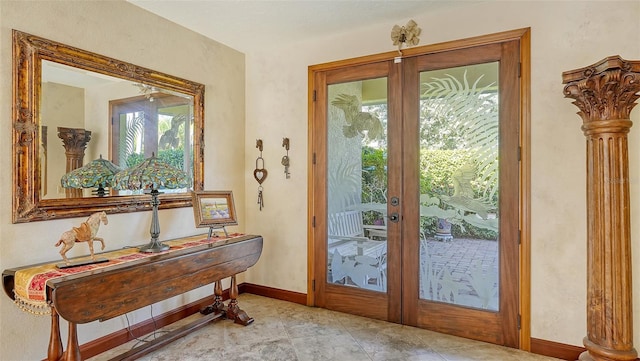 entryway with decorative columns