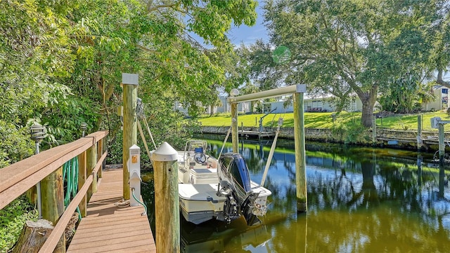 dock area featuring a water view