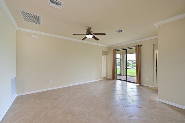 empty room with ornamental molding, ceiling fan, and light tile patterned flooring