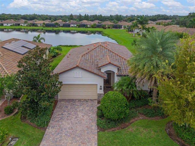 bird's eye view with a water view