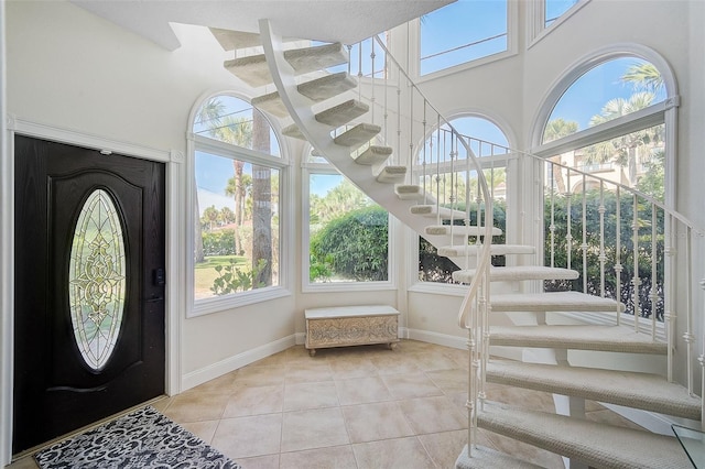 tiled entryway with plenty of natural light