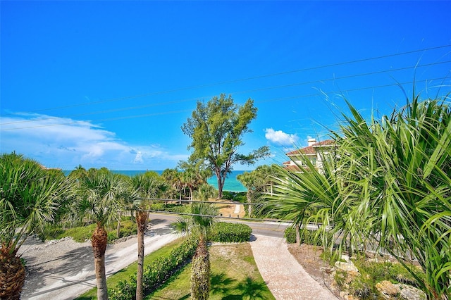 surrounding community featuring a water view