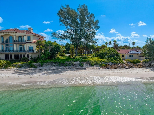 exterior space featuring a view of the beach