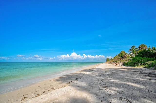 property view of water featuring a beach view