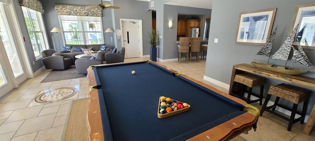 recreation room with pool table, ceiling fan, and light tile patterned floors