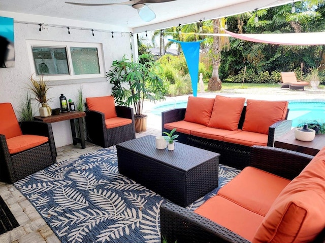 view of patio / terrace featuring an outdoor living space and ceiling fan