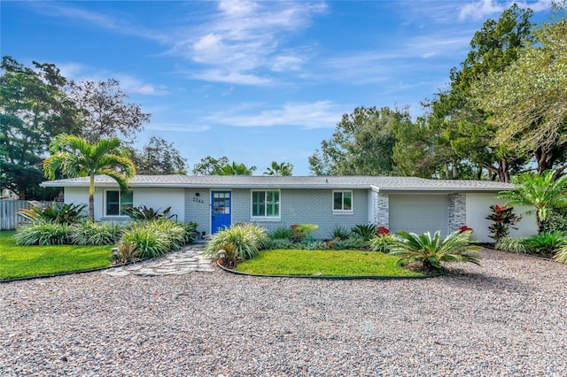 ranch-style home with a garage