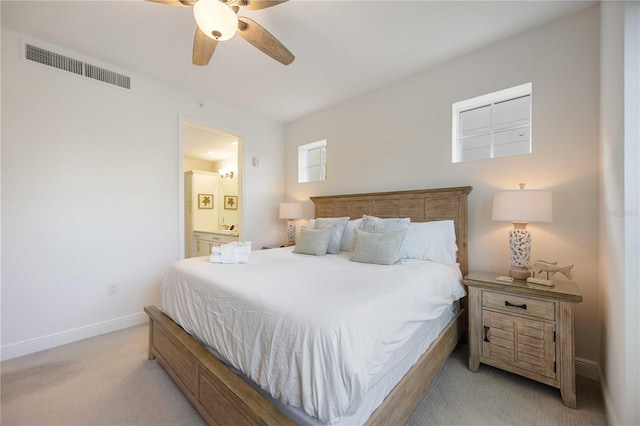 bedroom featuring ceiling fan and light colored carpet