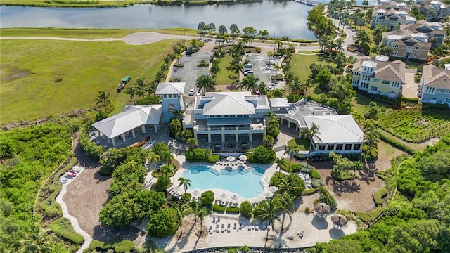 birds eye view of property featuring a water view