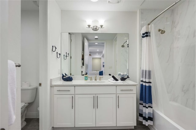 full bathroom featuring wood-type flooring, vanity, toilet, and shower / bathtub combination with curtain