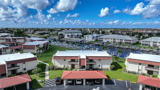 bird's eye view with a water view