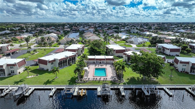 drone / aerial view featuring a water view