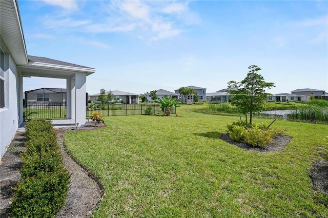 view of yard with a water view