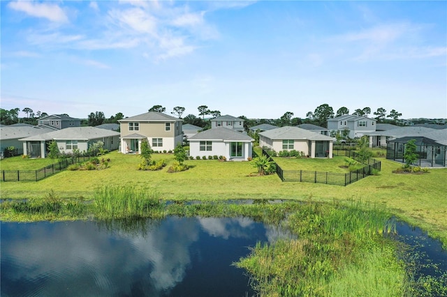 exterior space featuring a water view and a yard