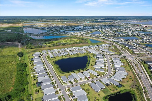 drone / aerial view with a water view