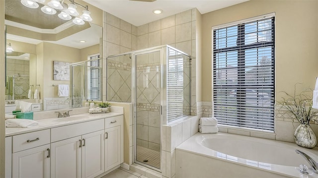 bathroom with independent shower and bath, vanity, and ornamental molding