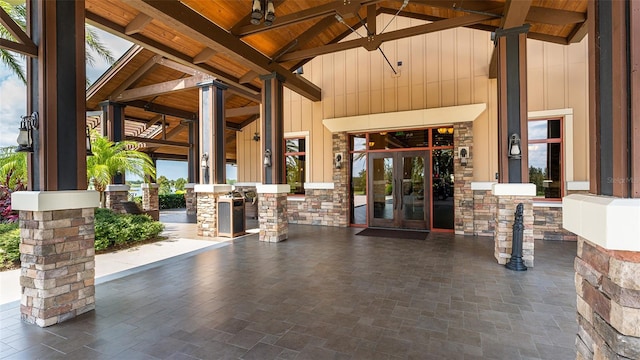 view of patio with ceiling fan, french doors, and an outdoor kitchen