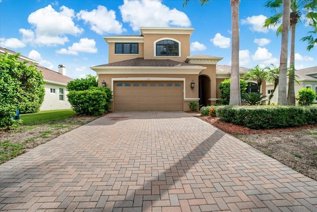 view of front of home with a garage