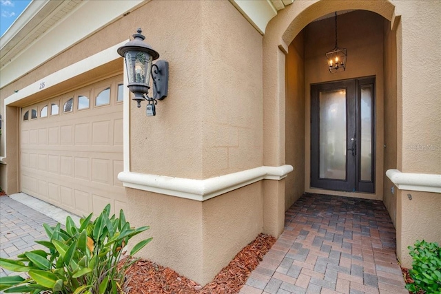 entrance to property with a garage