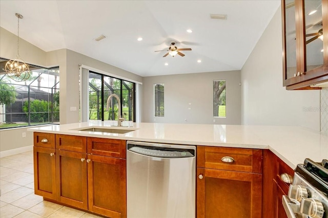 kitchen with ceiling fan, light tile patterned floors, sink, stainless steel dishwasher, and range