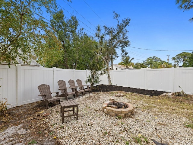 view of yard featuring a fire pit