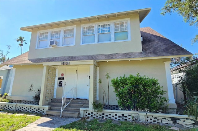 view of front of house with cooling unit