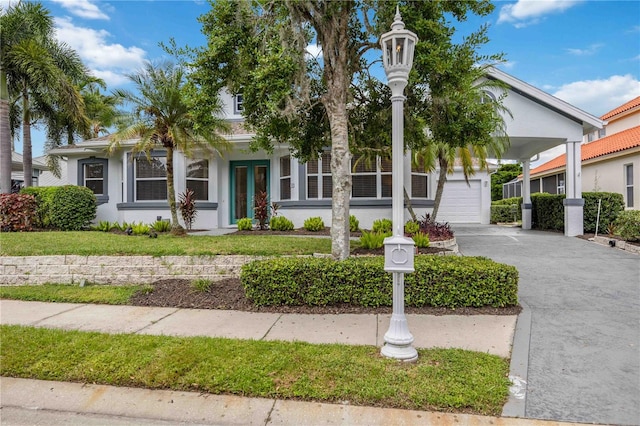 view of front of home featuring a carport