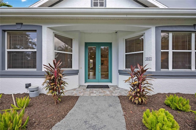 property entrance featuring french doors